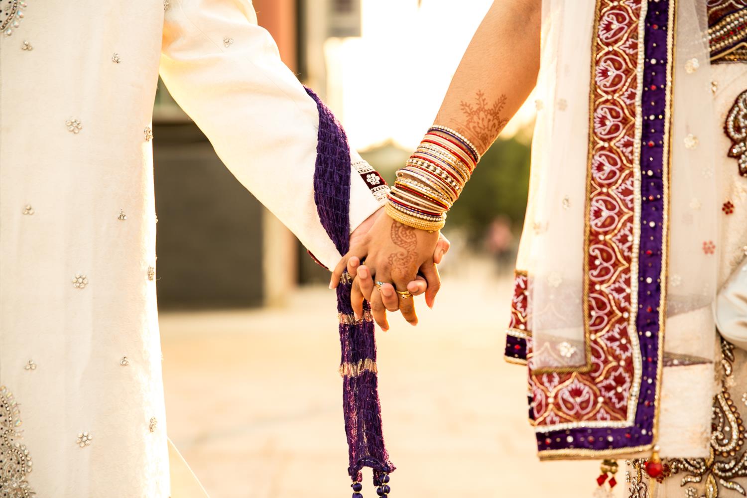 Wedding Photography of Bride and Groom holding hands in London by MAKSAM Photography