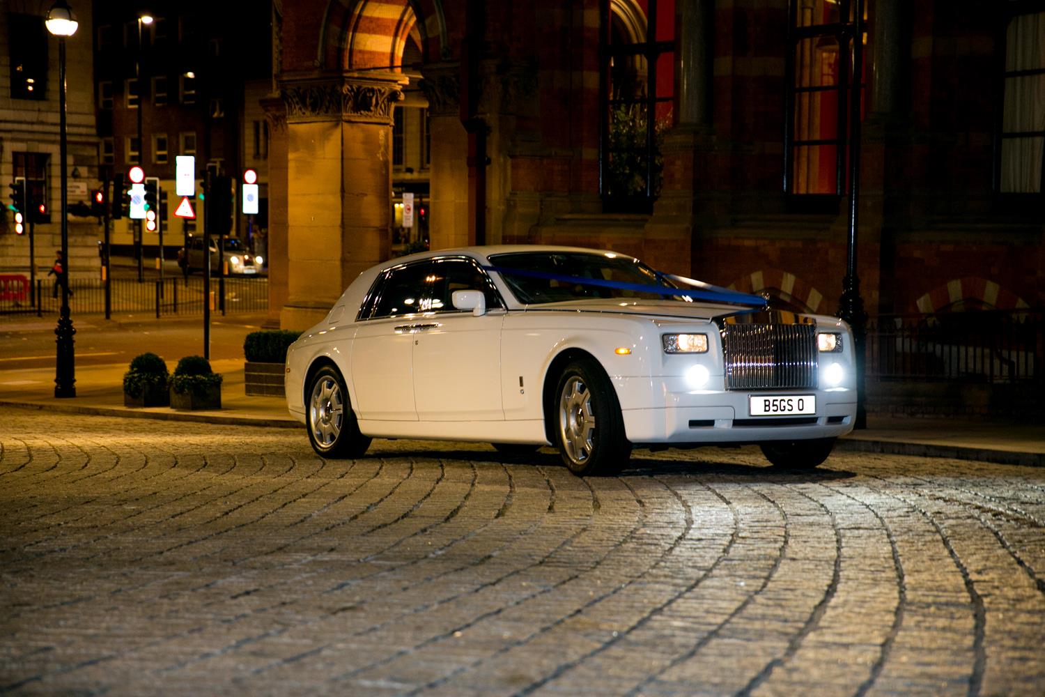 Wedding Photography of Rolls Royce outside London's Renaissance Hotel by MAKSAM Photographer London