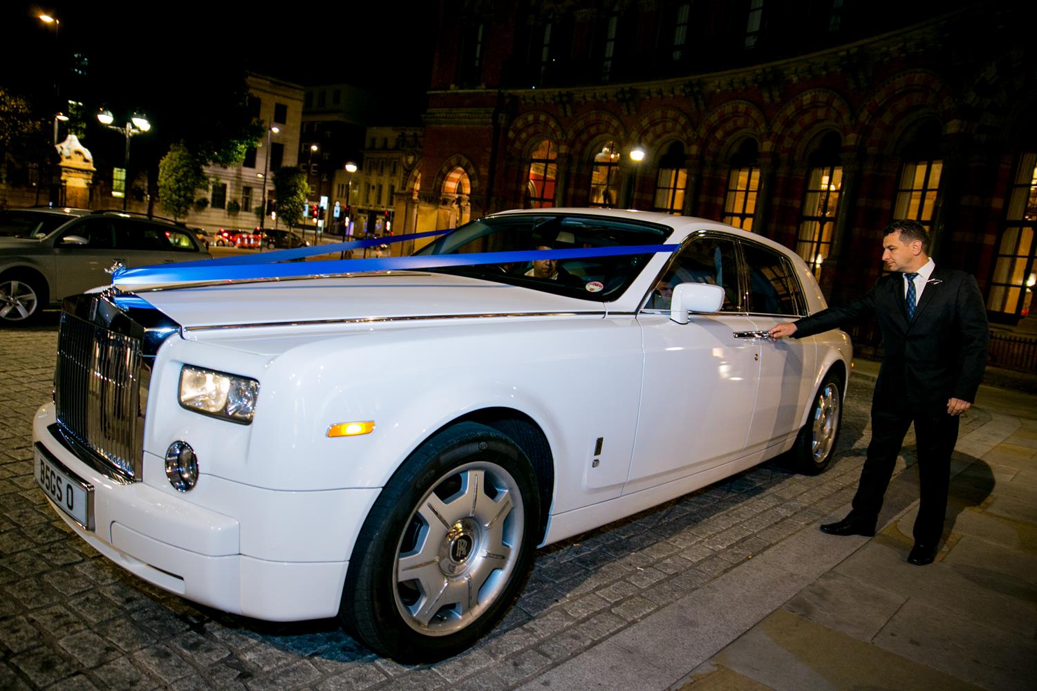 Wedding Photography of Rolls Royce outside London's Renaissance Hotel by MAKSAM Photographer London