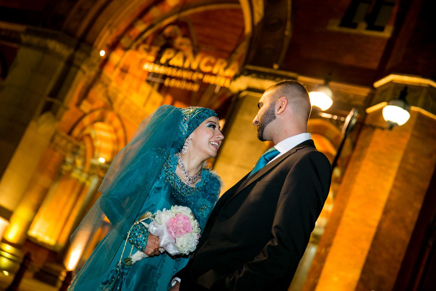 Muslim Wedding Photography of couple at their Indian Wedding by MAKSAM Photographer outside London's Renaissance Hotel