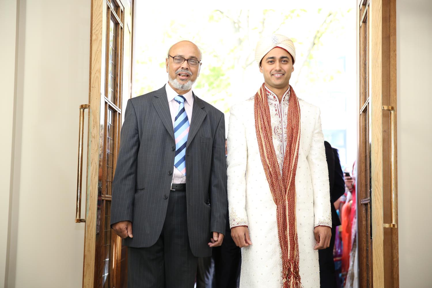 Wedding Photography of groom and his father arriving at their Indian Wedding by MAKSAM Photography London
