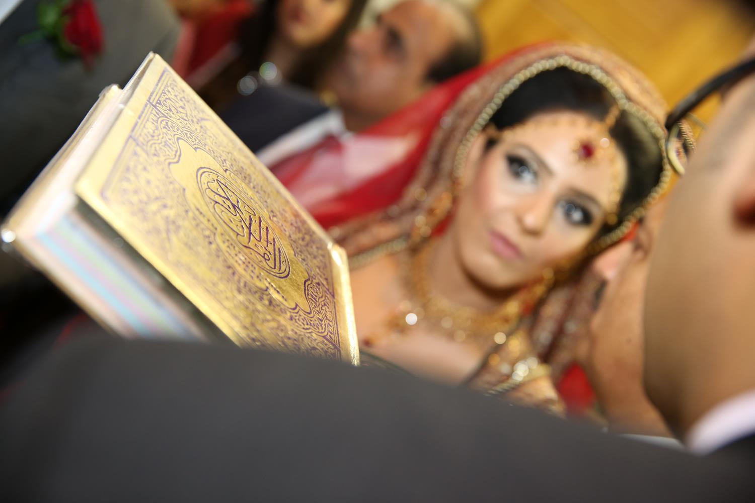 Wedding Photography of Quran following bride at her Asian Wedding by MAKSAM Photography London