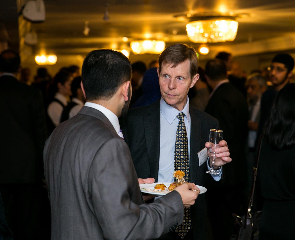 Corporate Photography of two business men talking by MAKSAM London Photographer