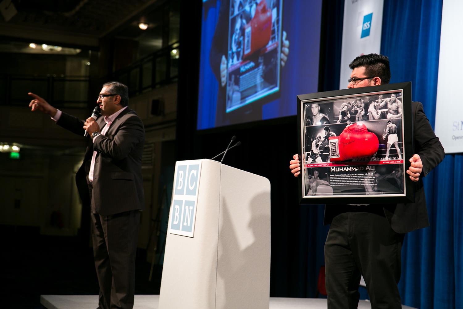 Corporate Event Photography auctioning Muhammad Ali Gloves by MAKSAM Corporate photographer