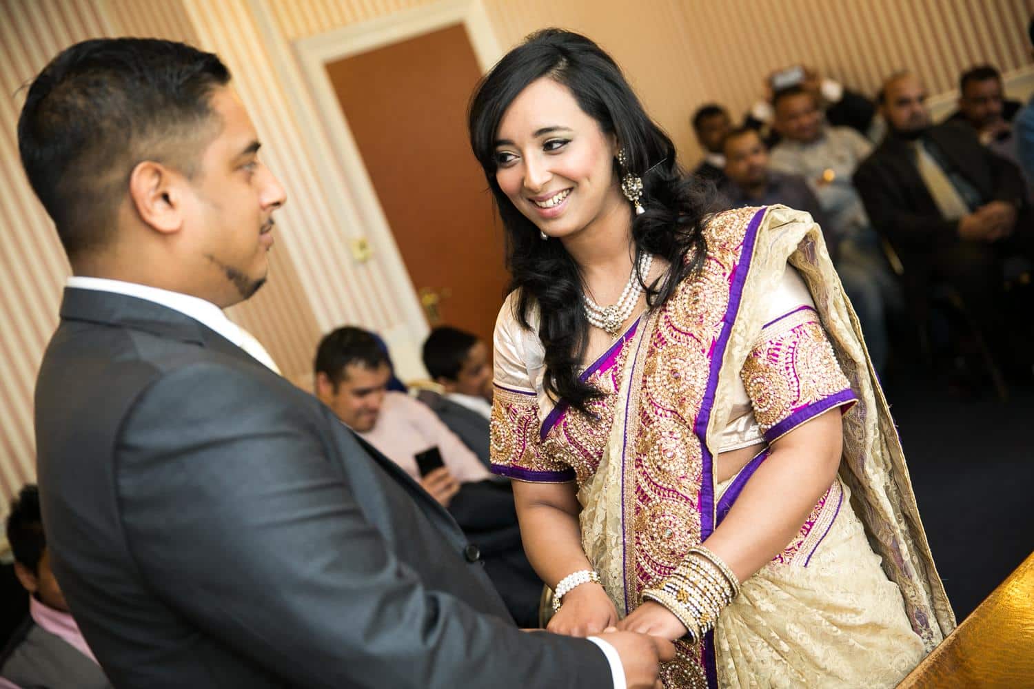 Registry Photography of couple holding hands and smiling by MAKSAM Photography