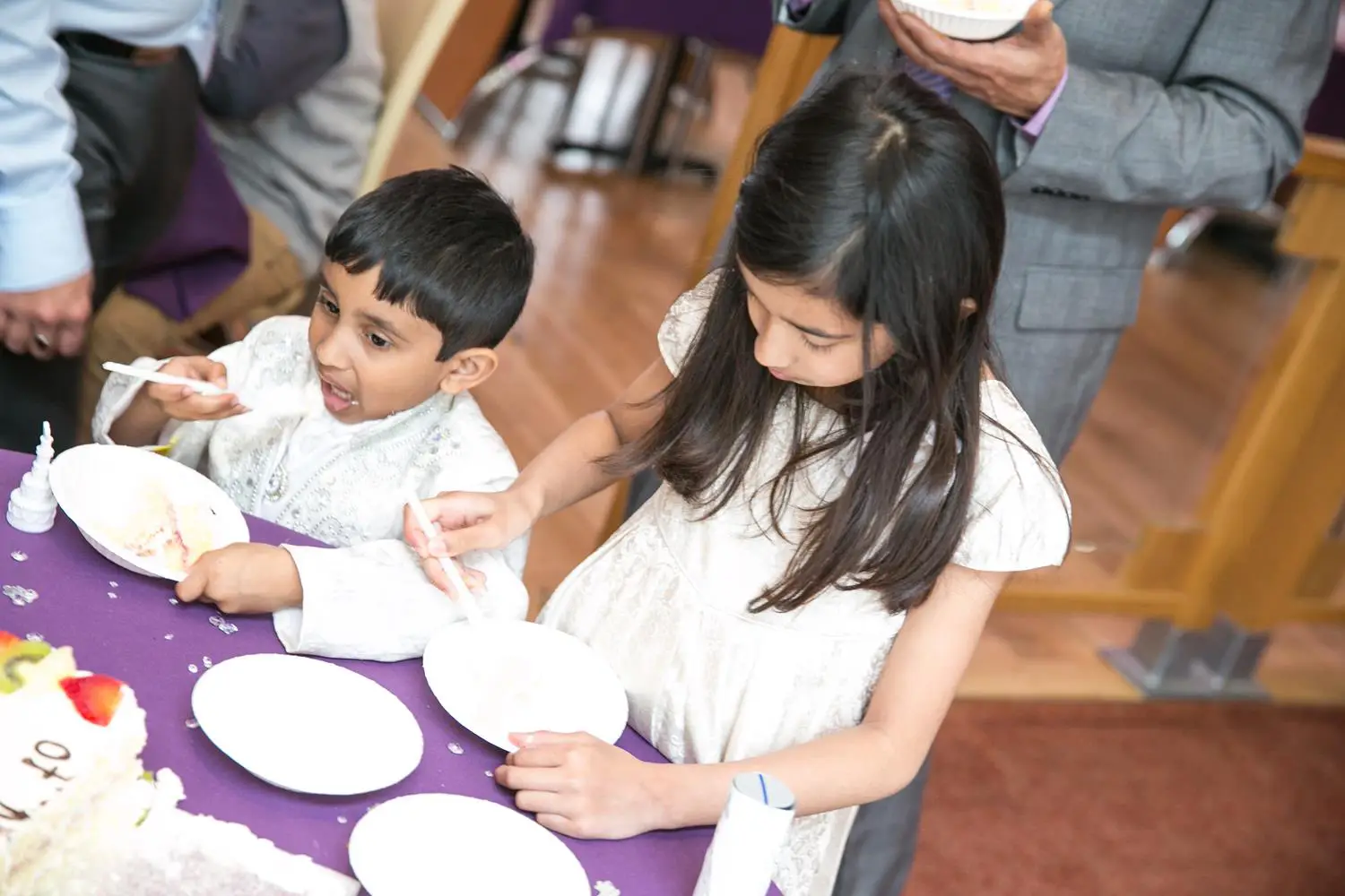 Kids enjoying food. Wedding Photography by MAKSAM