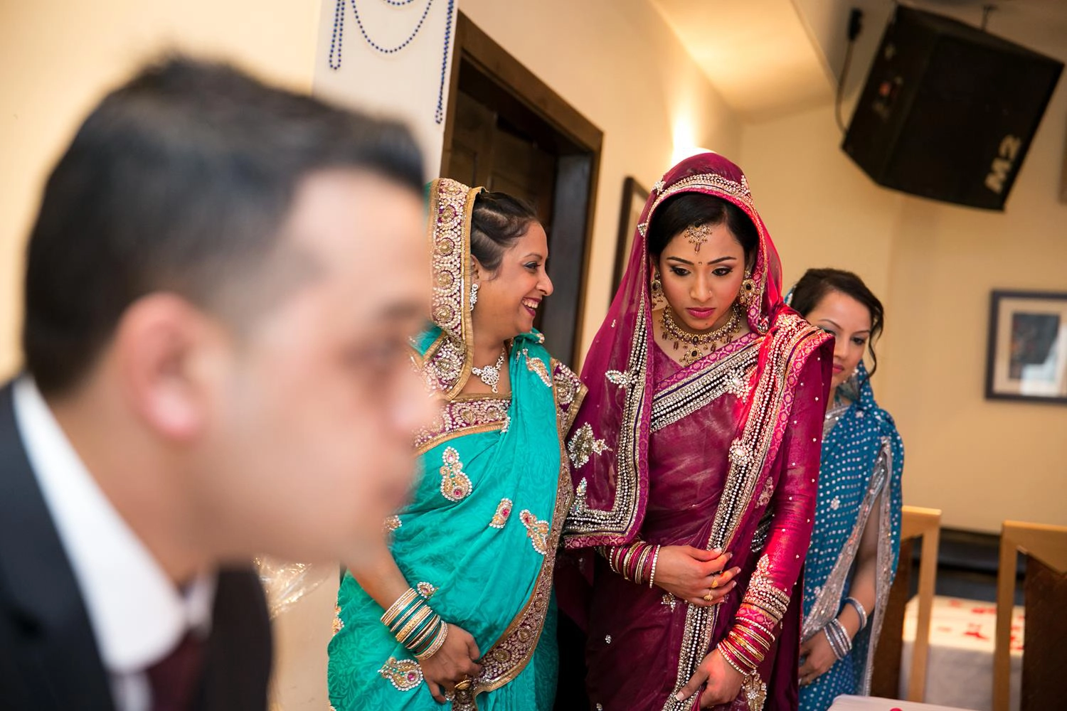 Bride in Red Dress at Indian Wedding by MAKSAM Photography