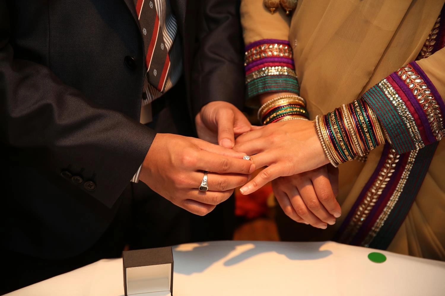 Engagement Ring exchange at Indian Wedding Photography London by MAKSAM Photography