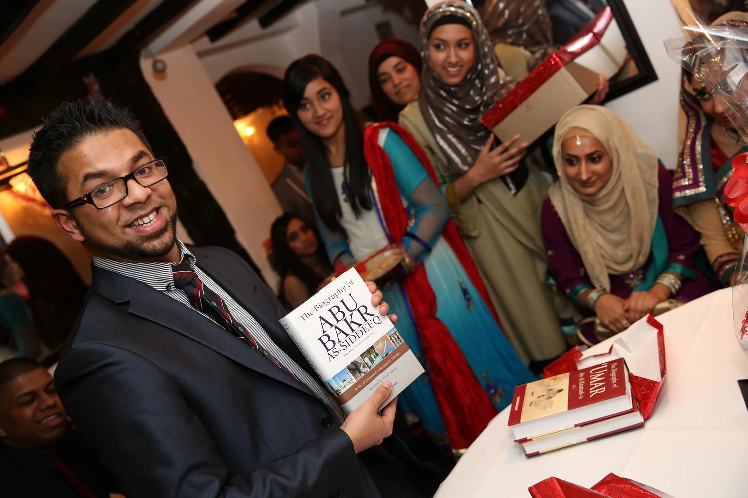 Bengali Engagement Photography Abu Bakr Book gift in London by MAKSAM Photography